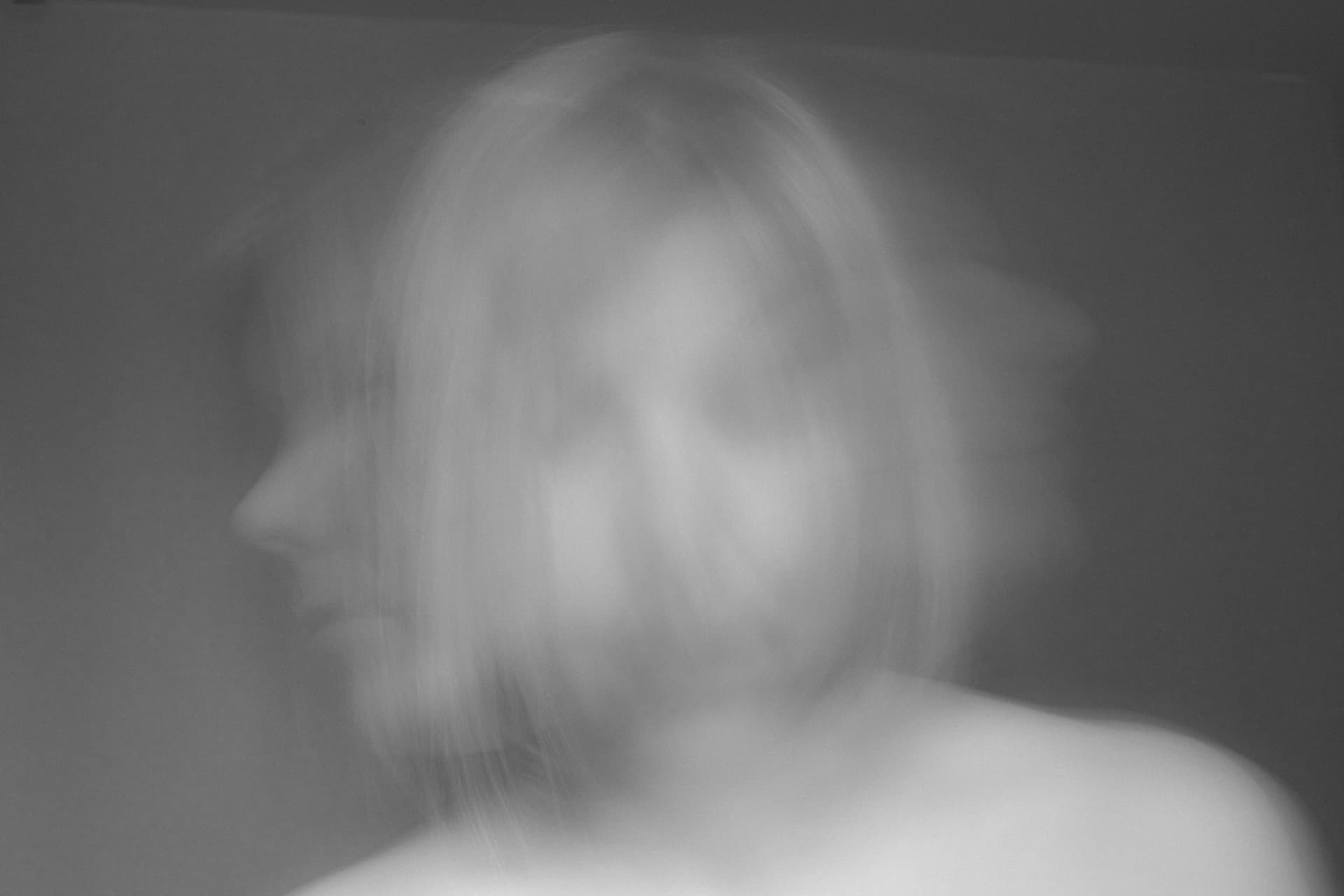 Brear-view-woman-against-wall.jpg