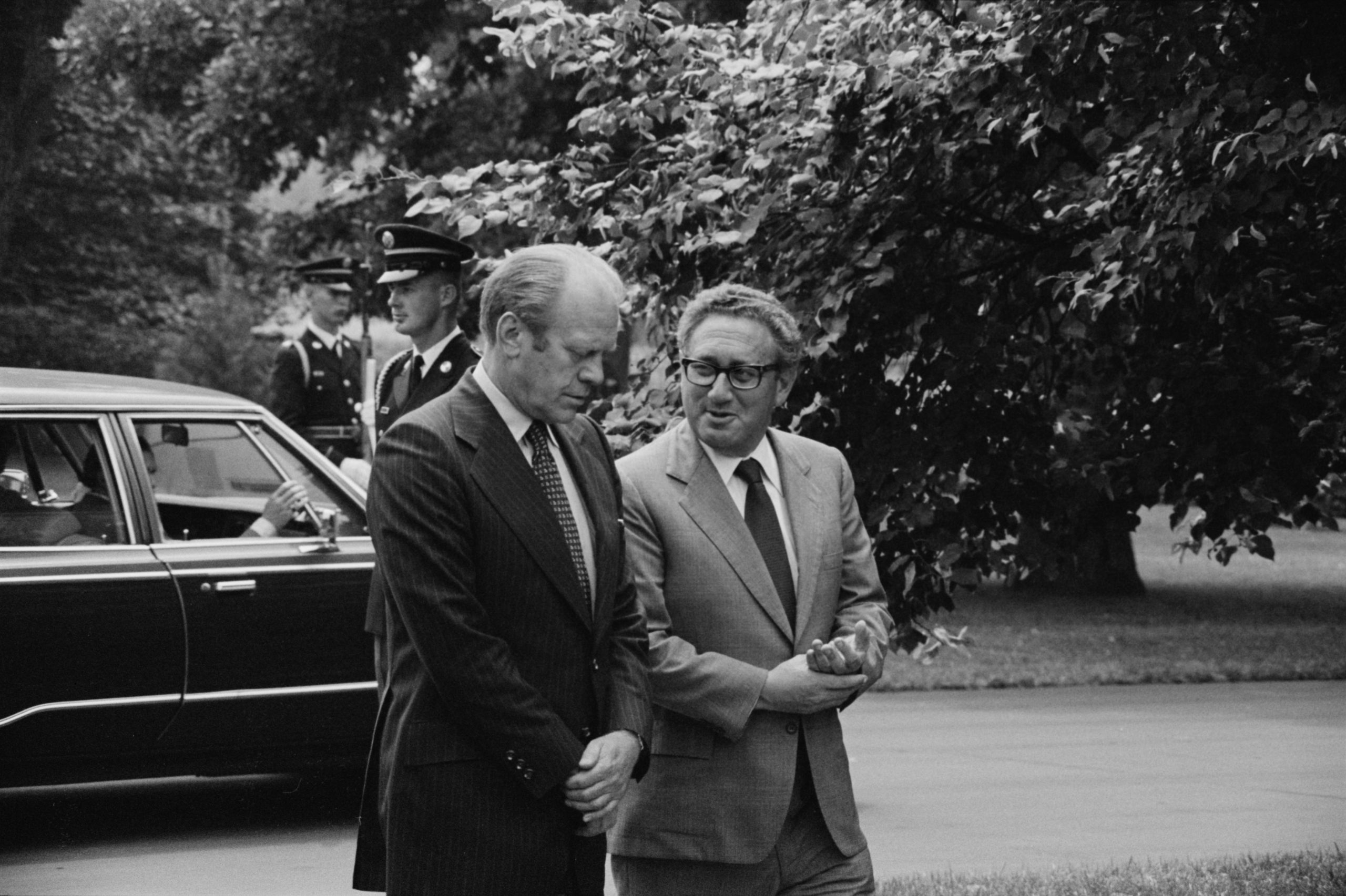 Ford and Kissinger conversing on grounds of White House 16 Aug 1974 scaled