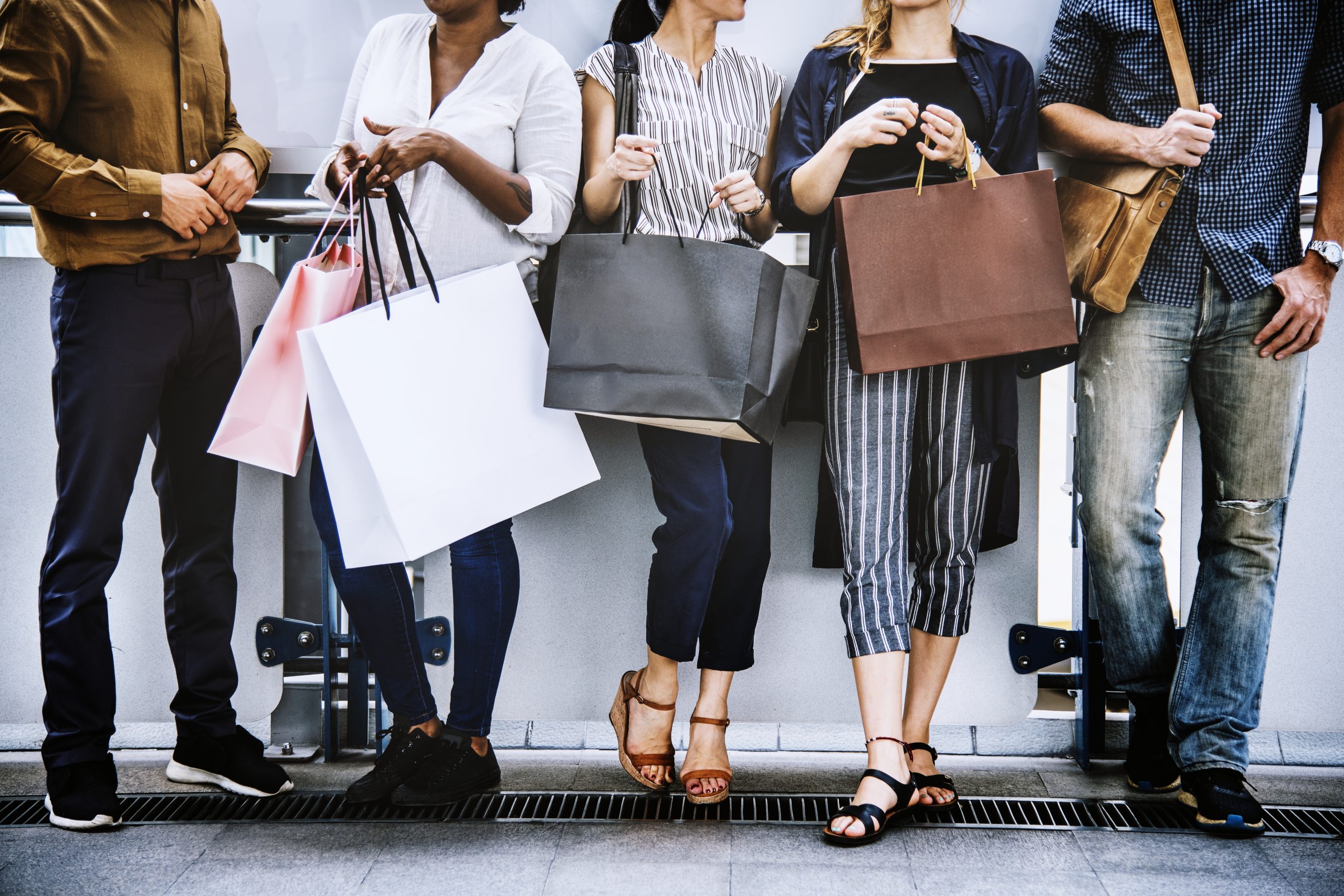 female friends out shopping together scaled