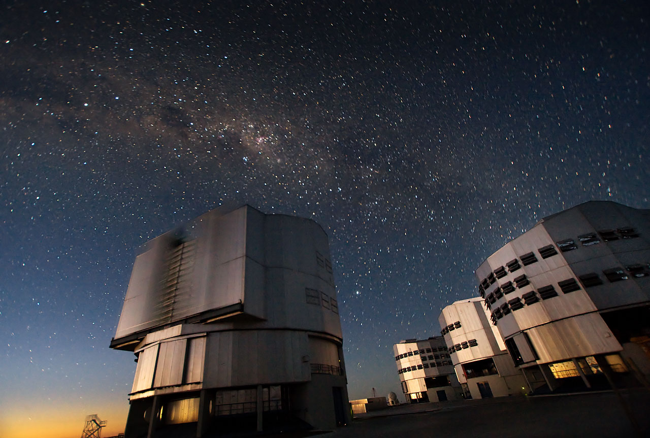 The Very Large Telescope (VLT) at ESO's Cerro Paranal observing site. Located in the Atacama Desert of Chile, the site is over 2600 metres above sea level, providing incredibly dry, dark viewing conditions. The VLT is the world’s most advanced optical instrument, consisting of four Unit Telescopes with main mirrors 8.2-m in diameter and four movable 1.8-m diameter Auxiliary Telescopes. The telescopes can work together, in groups of two or three, to form a giant interferometer, allowing astronomers to see details up to 25 times finer than with the individual telescopes.